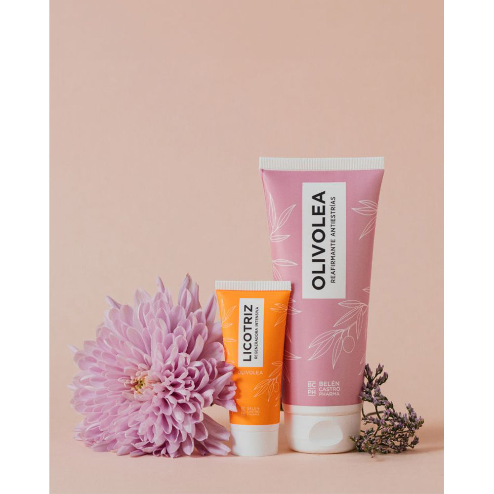 Productos Olivolea Licotriz y crema reafirmante en envases naranja y rosa, con flores decorativas, fondo rosa.